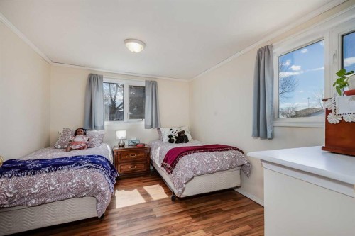 240 Big Hill Circle Se, Airdrie, AB - Indoor Photo Showing Bedroom