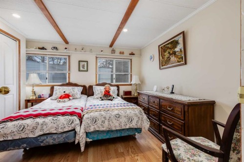 240 Big Hill Circle Se, Airdrie, AB - Indoor Photo Showing Bedroom