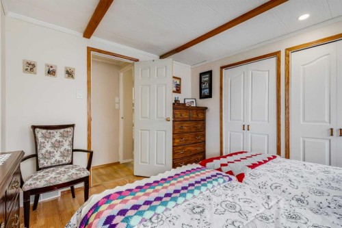 240 Big Hill Circle Se, Airdrie, AB - Indoor Photo Showing Bedroom