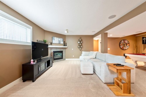 142 Coventry View Ne, Calgary, AB - Indoor Photo Showing Other Room With Fireplace
