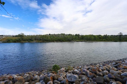 20-8544 48 Avenue Nw, Calgary, AB - Outdoor With Body Of Water With View