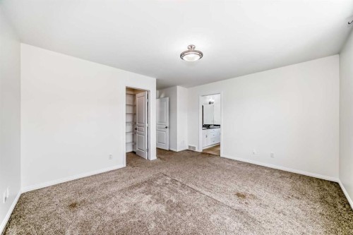 27 Aspen Hills Close Sw, Calgary, AB - Indoor Photo Showing Other Room