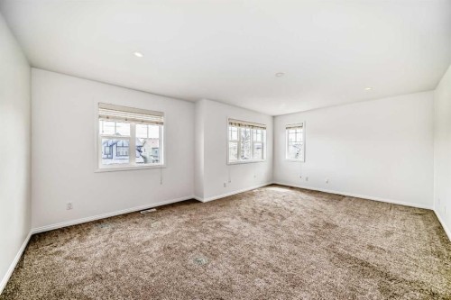 27 Aspen Hills Close Sw, Calgary, AB - Indoor Photo Showing Other Room