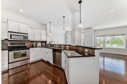 27 Aspen Hills Close Sw, Calgary, AB - Indoor Photo Showing Kitchen With Stainless Steel Kitchen With Upgraded Kitchen