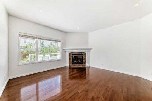 27 Aspen Hills Close Sw, Calgary, AB - Indoor Photo Showing Living Room With Fireplace