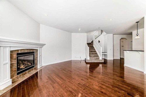 27 Aspen Hills Close Sw, Calgary, AB - Indoor Photo Showing Living Room With Fireplace
