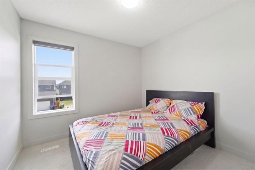 9060 52 Street Ne, Calgary, AB - Indoor Photo Showing Bedroom
