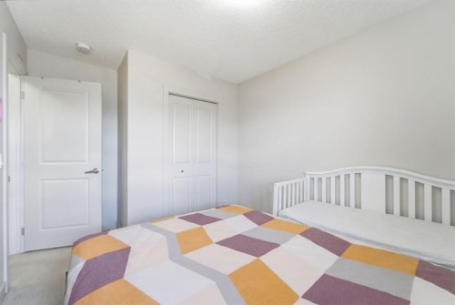 9060 52 Street Ne, Calgary, AB - Indoor Photo Showing Bedroom