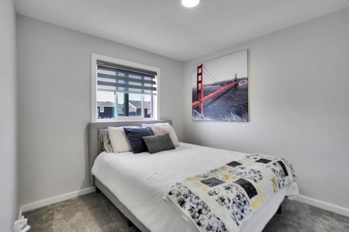 112 Langwell Common Se, Airdrie, AB - Indoor Photo Showing Bedroom