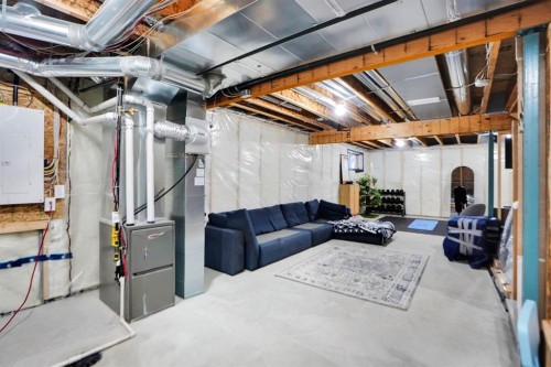 112 Langwell Common Se, Airdrie, AB - Indoor Photo Showing Basement