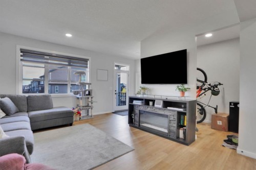 112 Langwell Common Se, Airdrie, AB - Indoor Photo Showing Living Room