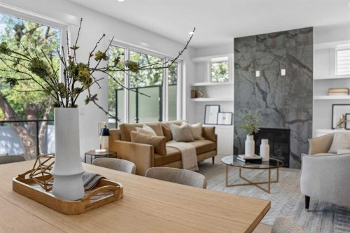 602 25 Avenue Ne, Calgary, AB - Indoor Photo Showing Living Room With Fireplace
