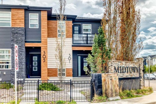 301 Midtown Gate Sw, Airdrie, AB - Outdoor With Facade