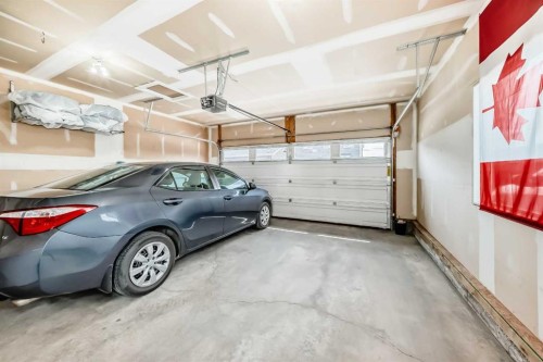 301 Midtown Gate Sw, Airdrie, AB - Indoor Photo Showing Garage