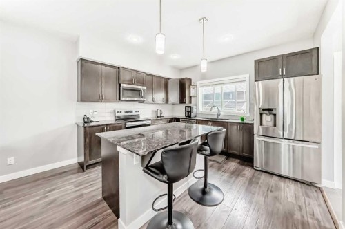 301 Midtown Gate Sw, Airdrie, AB - Indoor Photo Showing Kitchen With Stainless Steel Kitchen With Upgraded Kitchen