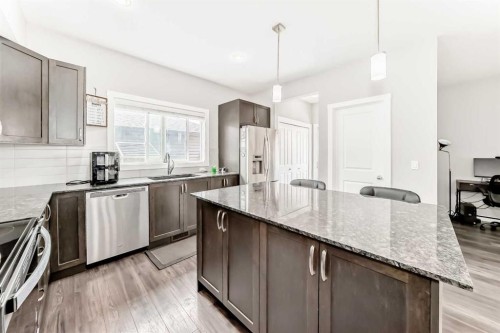 301 Midtown Gate Sw, Airdrie, AB - Indoor Photo Showing Kitchen With Stainless Steel Kitchen With Upgraded Kitchen