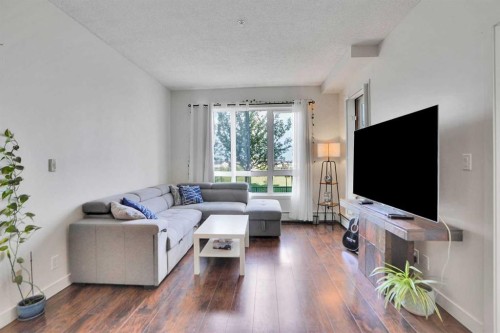 3102-175 Silverado Boulevard Sw, Calgary, AB - Indoor Photo Showing Living Room