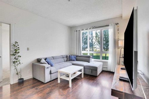 3102-175 Silverado Boulevard Sw, Calgary, AB - Indoor Photo Showing Living Room