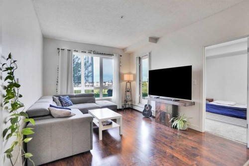 3102-175 Silverado Boulevard Sw, Calgary, AB - Indoor Photo Showing Living Room