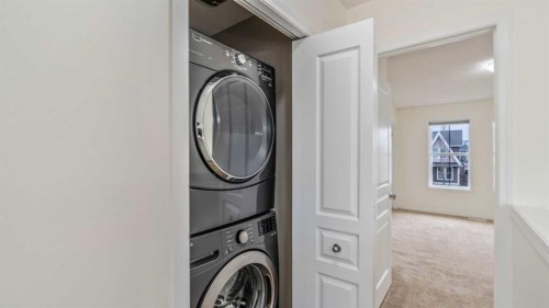 484 Auburn Bay Avenue Se, Calgary, AB - Indoor Photo Showing Laundry Room