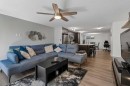 202 Auburn Bay Circle Se, Calgary, AB  - Indoor Photo Showing Living Room 