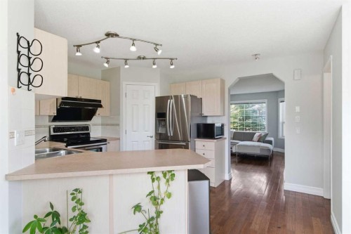 204 Citadel Bluff Close Nw, Calgary, AB - Indoor Photo Showing Kitchen With Double Sink