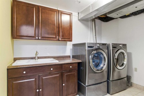 204 Citadel Bluff Close Nw, Calgary, AB - Indoor Photo Showing Laundry Room
