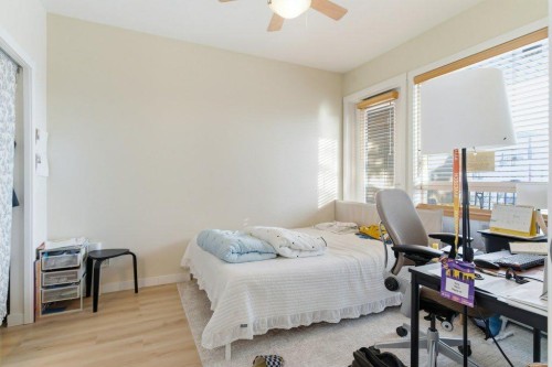 210-69 Springborough Court Sw, Calgary, AB - Indoor Photo Showing Bedroom