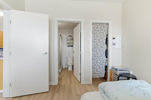 210-69 Springborough Court Sw, Calgary, AB - Indoor Photo Showing Bedroom