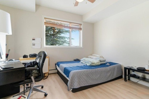 210-69 Springborough Court Sw, Calgary, AB - Indoor Photo Showing Bedroom