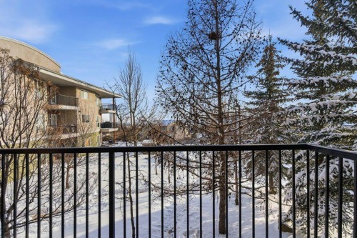 210-69 Springborough Court Sw, Calgary, AB - Outdoor With Balcony