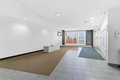 210-69 Springborough Court Sw, Calgary, AB - Indoor Photo Showing Other Room
