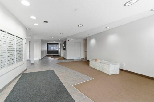 210-69 Springborough Court Sw, Calgary, AB - Indoor Photo Showing Other Room