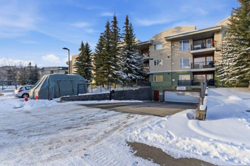 210-69 Springborough Court Sw, Calgary, AB - Outdoor With Balcony
