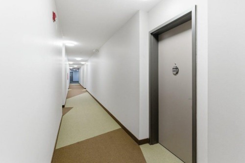 210-69 Springborough Court Sw, Calgary, AB - Indoor Photo Showing Other Room