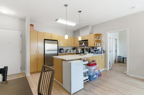 210-69 Springborough Court Sw, Calgary, AB - Indoor Photo Showing Kitchen