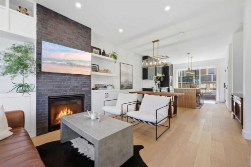 3707 30 Avenue Sw, Calgary, AB - Indoor Photo Showing Living Room With Fireplace