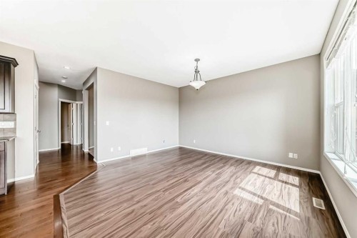196 Cranberry Circle Se, Calgary, AB - Indoor Photo Showing Other Room With Fireplace