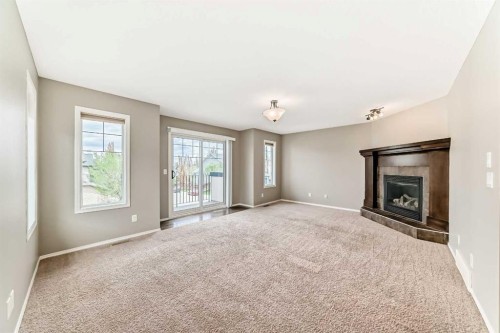 196 Cranberry Circle Se, Calgary, AB - Indoor With Fireplace