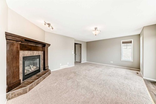 196 Cranberry Circle Se, Calgary, AB - Indoor With Fireplace