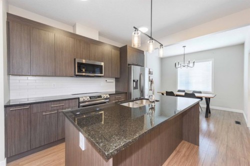 82-300 Marina Drive, Chestermere, AB - Indoor Photo Showing Kitchen With Upgraded Kitchen