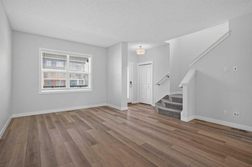 326 Creekside Boulevard Sw, Calgary, AB - Indoor Photo Showing Other Room