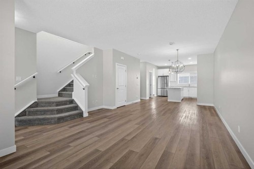 326 Creekside Boulevard Sw, Calgary, AB - Indoor Photo Showing Other Room