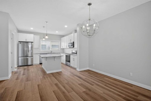 326 Creekside Boulevard Sw, Calgary, AB - Indoor Photo Showing Kitchen With Upgraded Kitchen