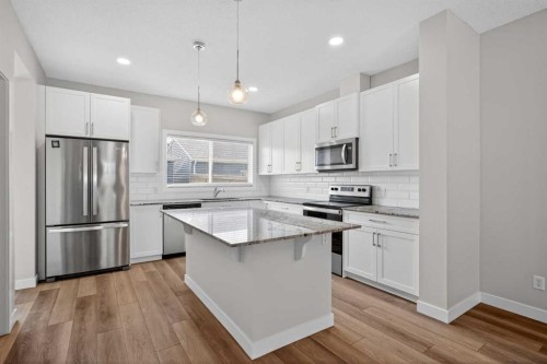 326 Creekside Boulevard Sw, Calgary, AB - Indoor Photo Showing Kitchen With Upgraded Kitchen