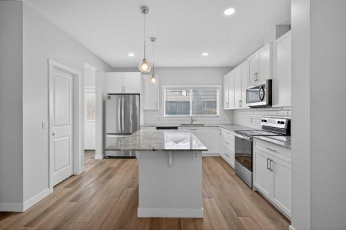 326 Creekside Boulevard Sw, Calgary, AB - Indoor Photo Showing Kitchen With Upgraded Kitchen