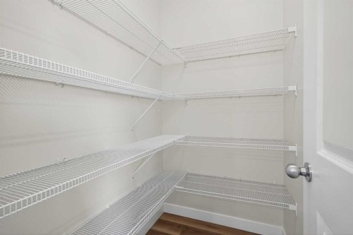326 Creekside Boulevard Sw, Calgary, AB - Indoor With Storage
