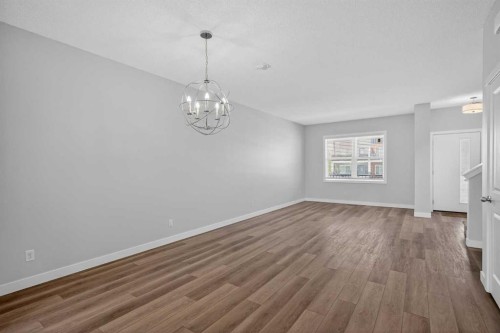 326 Creekside Boulevard Sw, Calgary, AB - Indoor Photo Showing Other Room