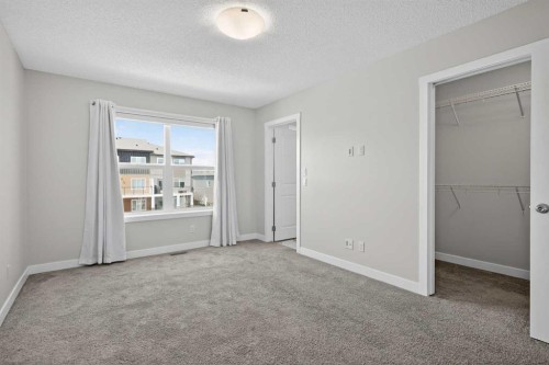 326 Creekside Boulevard Sw, Calgary, AB - Indoor Photo Showing Other Room