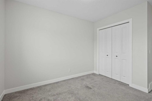 326 Creekside Boulevard Sw, Calgary, AB - Indoor Photo Showing Other Room